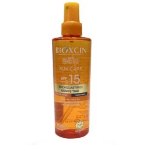 اسپری روغن برنز کننده دارای spf15 حجم 200 میل بیوکسین